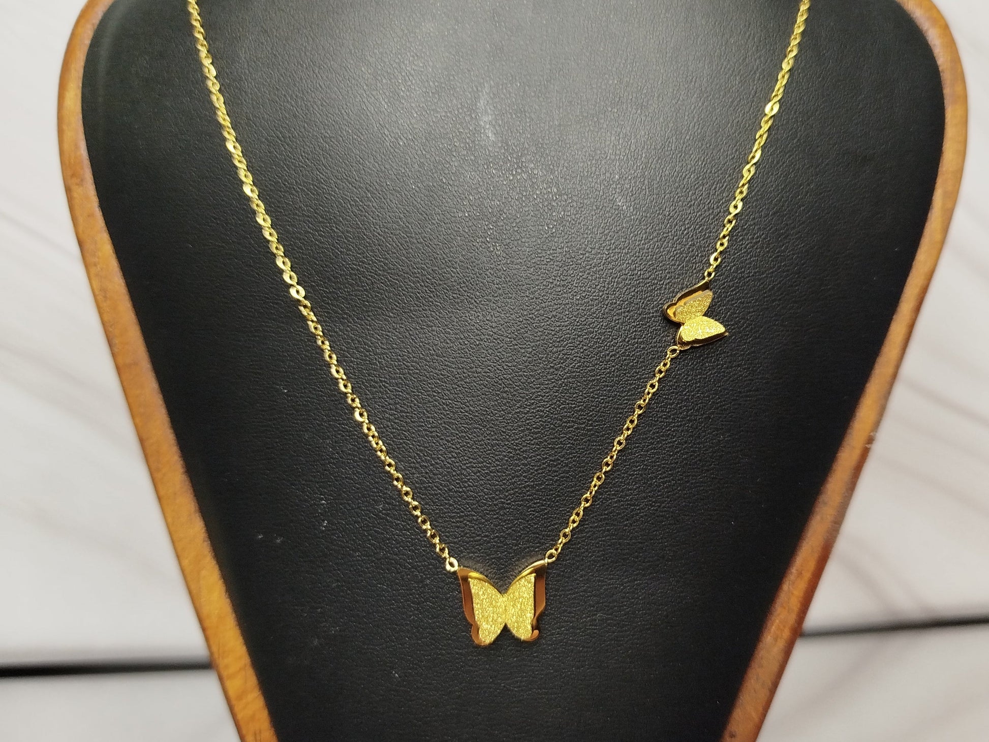 Gold butterfly necklace