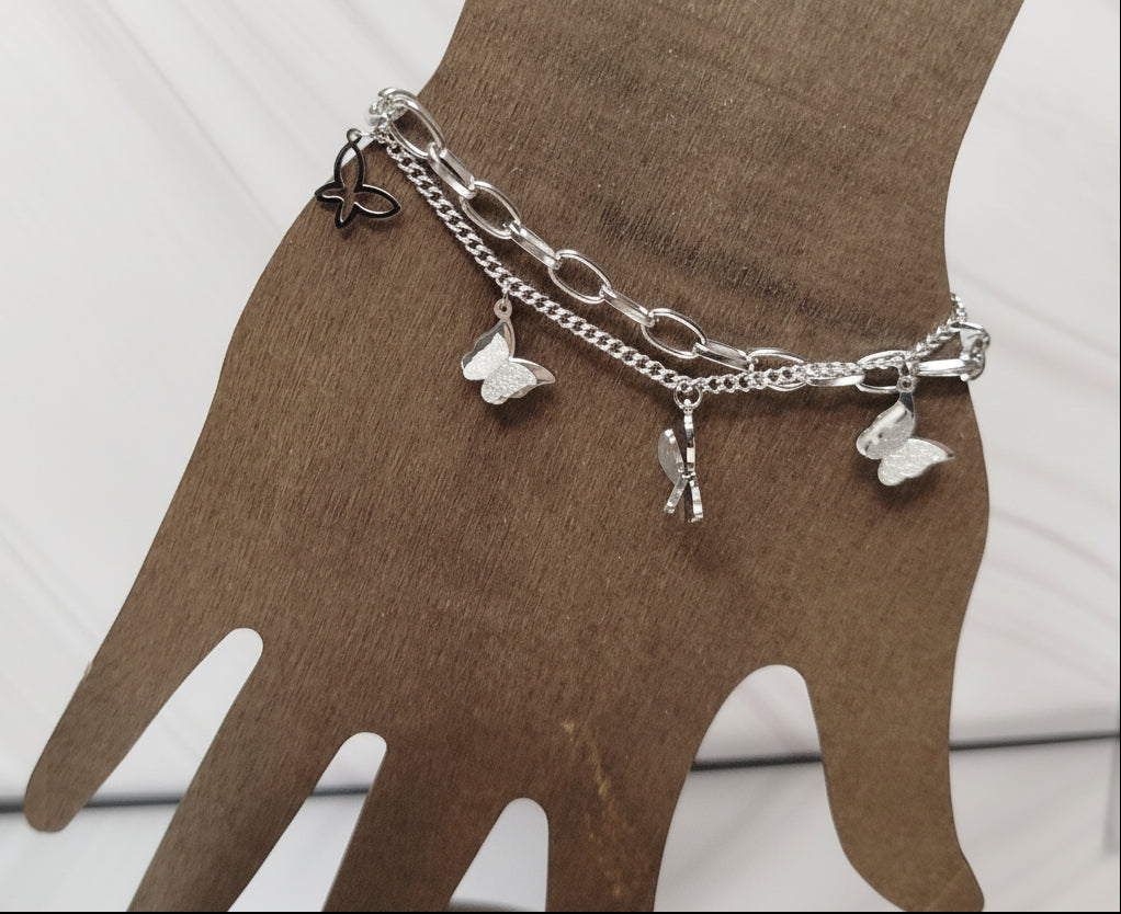 Silver bracelet with butterfly charms
